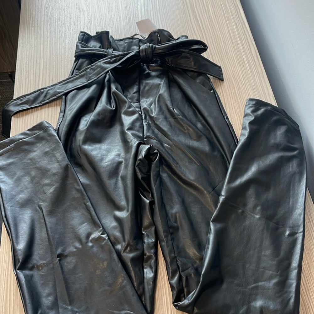 Akira SM Black Faux leather high waist pleated straight leg pant with belt. NWT